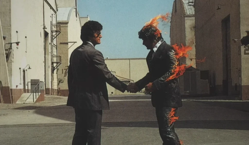 Pink Floyd: Η πραγματική ιστορία πίσω από τον φλεγόμενο επιχειρηματία του «Wish You Were Here»